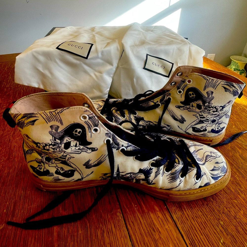 Gucci Donald Duck high tops.   Gucci / Disney collaboration.   Amazing shoes